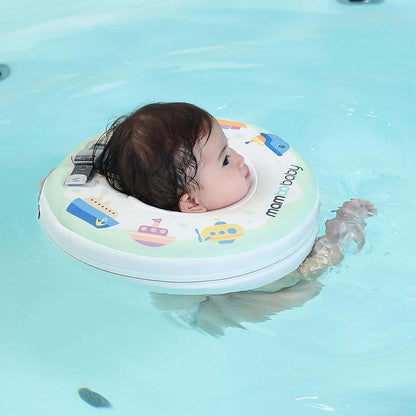 Relaxed infant resting comfortably in the Mambobaby™ Boats Neck Float during bath time.