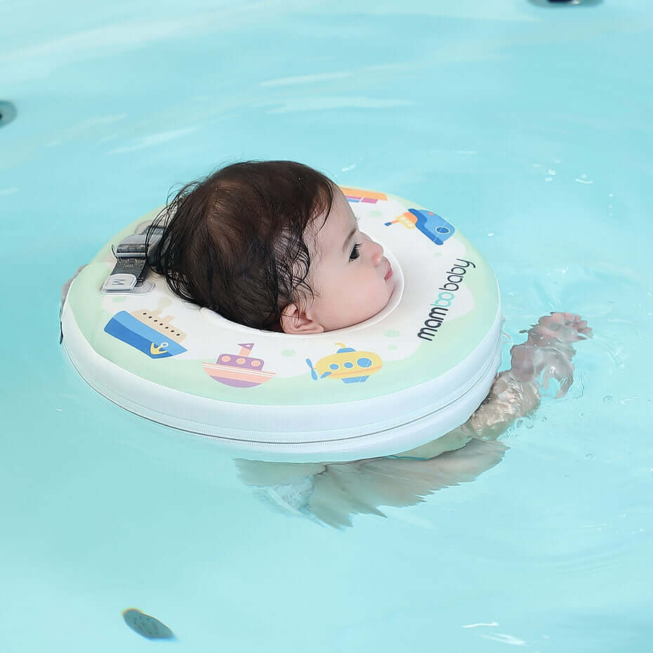 Relaxed infant resting comfortably in the Mambobaby™ Neck Float during bath time.