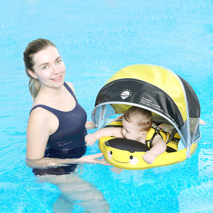 A happy baby safely enjoying the water in a Mambobaby™ Bee Float, demonstrating stable 360-degree protection.