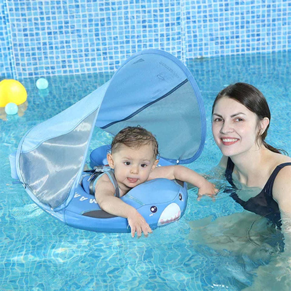 A baby safely enjoying the water in a Mambobaby™ Shark Float, demonstrating the stable 40-degree swimming angle.